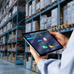 Industrial technology concept showing connected supply chain, manufacturing systems, AI, IoT, and operational data working together to improve visibility, resilience, and decision-making.