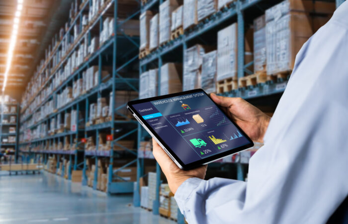 Industrial technology concept showing connected supply chain, manufacturing systems, AI, IoT, and operational data working together to improve visibility, resilience, and decision-making.