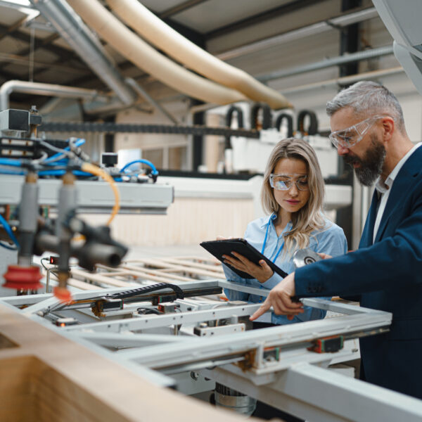 Manufacturing production line with digital data connections linking products to a central record